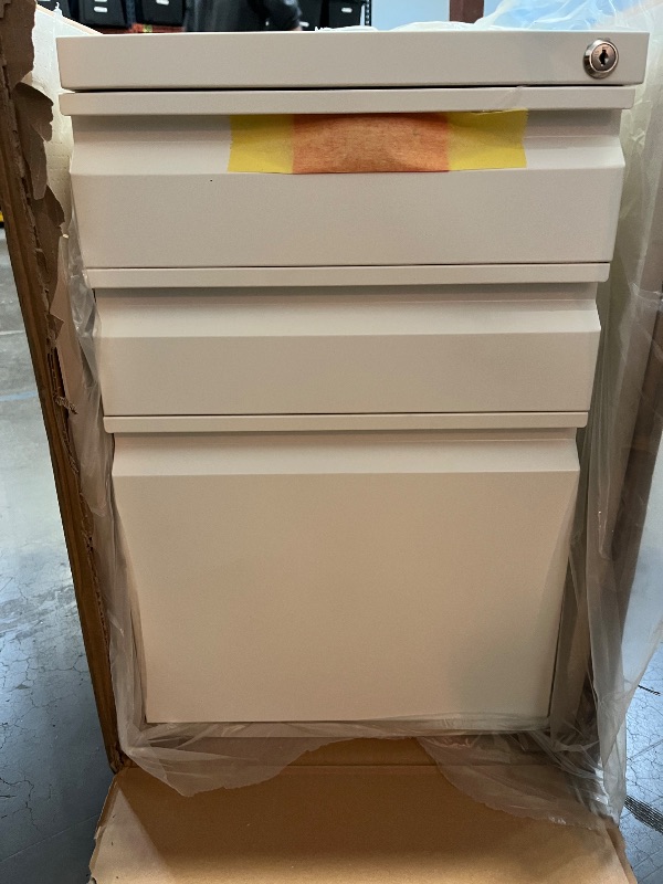 Photo 1 of Mount-It! 3 Drawer File Cabinet with Lock and Wheels, Under Desk Storage Filing Pedestal for Home Office, No Assembly Small Rolling File Cabinet for Legal, Letter, and A4 Files in White