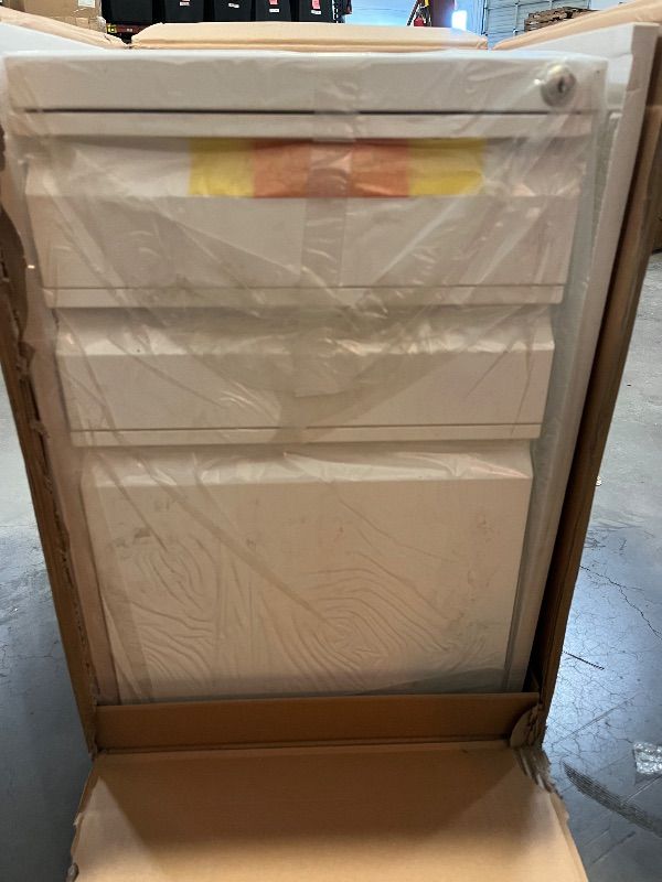 Photo 1 of Mount-It! 3 Drawer File Cabinet with Lock and Wheels, Under Desk Storage Filing Pedestal for Home Office, No Assembly Small Rolling File Cabinet for Legal, Letter, and A4 Files in White
