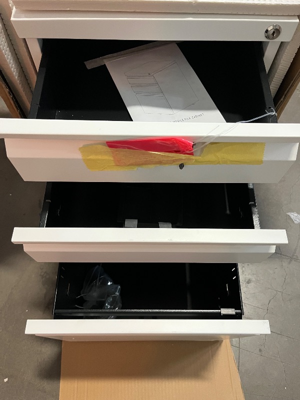 Photo 1 of Mount-It! 3 Drawer File Cabinet with Lock and Wheels, Under Desk Storage Filing Pedestal for Home Office, No Assembly Small Rolling File Cabinet for Legal, Letter, and A4 Files in White
