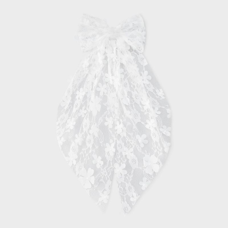 Photo 1 of Floral Lace Bow Hair Barrette - Wild Fable™ White: Fashion Accessory for All Hair Types, Polyester and Iron
