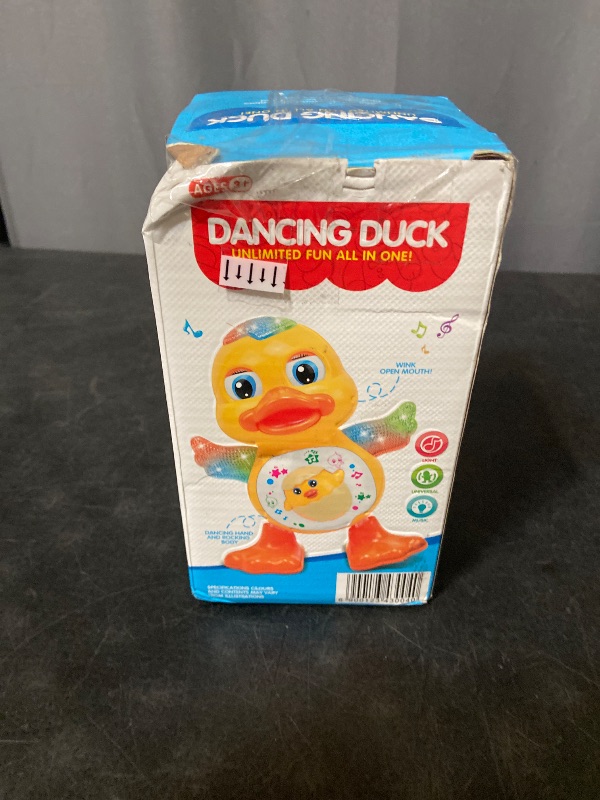 Photo 1 of Electric Music Light Dancing Duck with Cute Blinking and Shaking Head Educational Electronic Pet