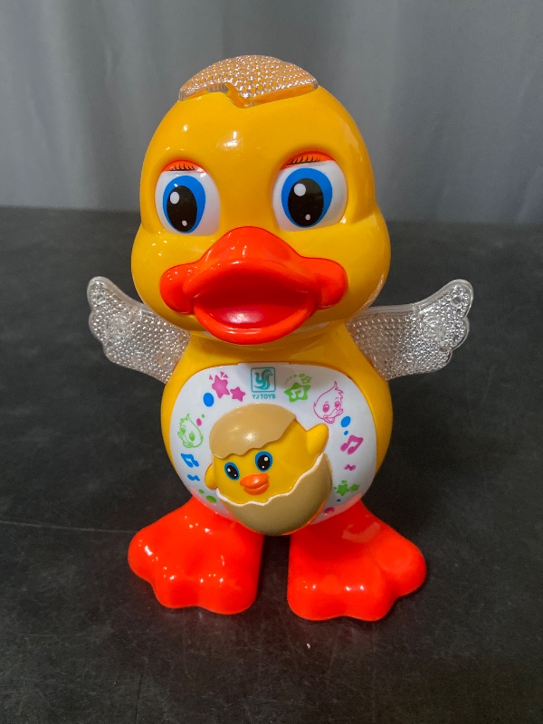 Photo 1 of Electric Music Light Dancing Duck with Cute Blinking and Shaking Head Educational Electronic Pet