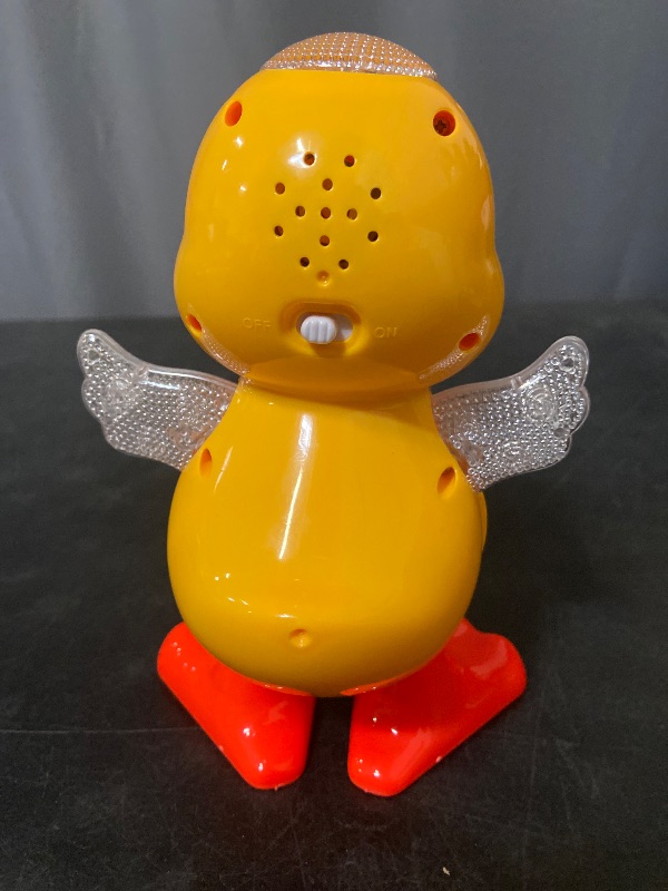 Photo 1 of Electric Music Light Dancing Duck with Cute Blinking and Shaking Head Educational Electronic Pet