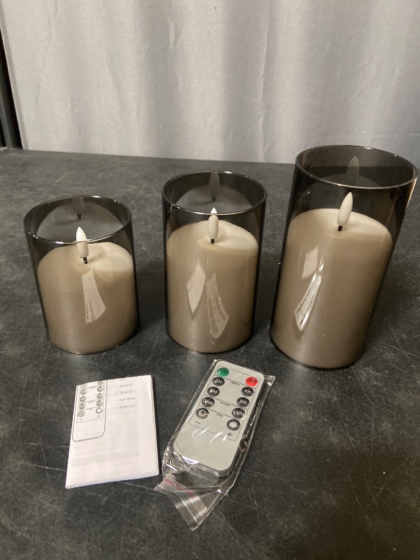 Photo 1 of Black Fake Candles Battery Operated, Flickering Flameless Candles with Timer and Remote, Glass LED Electric Pillar Candles Set of 3 for Home Coffee Table Bathroom Decor