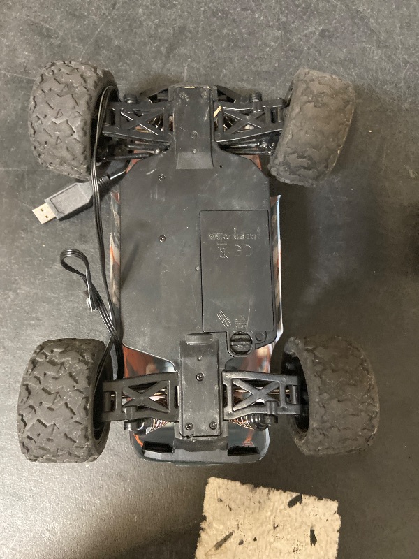 Photo 1 of Black Hole 2.4GHz High-Speed Vehicle 4x4 Scale 36 kph RC Car with Remote Control & Batteries A1