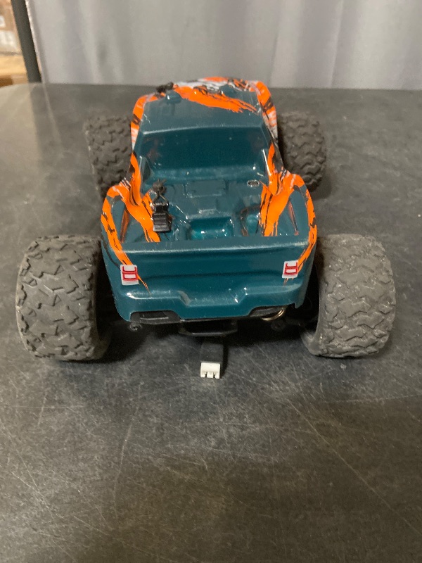 Photo 1 of Black Hole 2.4GHz High-Speed Vehicle 4x4 Scale 36 kph RC Car with Remote Control & Batteries A1