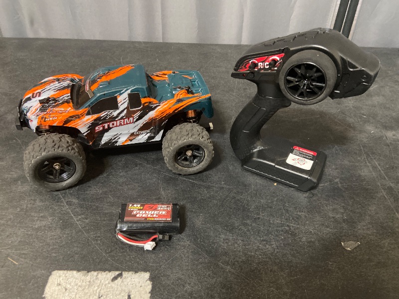 Photo 1 of Black Hole 2.4GHz High-Speed Vehicle 4x4 Scale 36 kph RC Car with Remote Control & Batteries A1