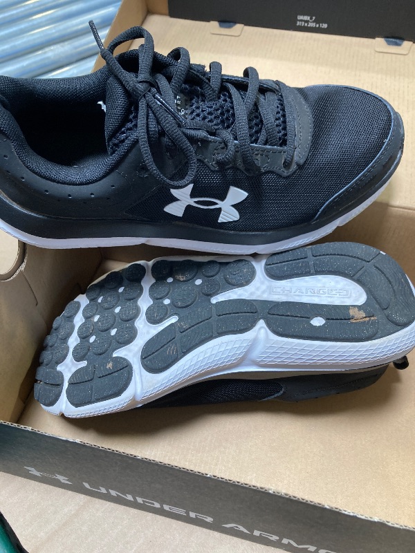 Photo 1 of Under Armour Women's Charged Assert 10, (001) Black/Black/White, 8.5, US