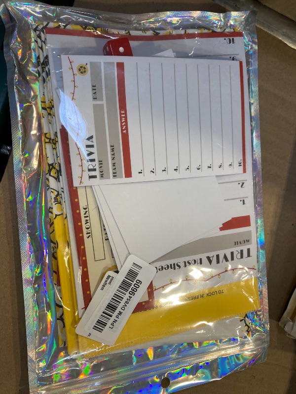 Photo 1 of Deluxe Movie Night Décor DIY Kit - Concession Stand Decorations, Movie Tickets, Popcorn Bags, Trivia Cards and More (28 piece)