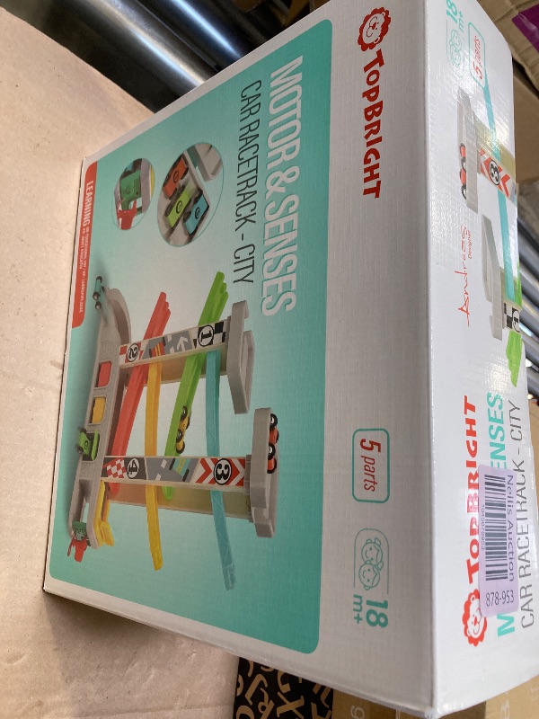 Photo 1 of TOP BRIGHT Car Ramp Toy for 2 3 Year Old Boy Gifts, Toddler Race Track Toy for 18 Month Old with 4 Wooden Cars and 3 Car Garage