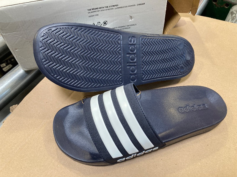 Photo 1 of adidas Unisex Adilette Comfort Slides Sandal, Core , 11 Women/10 Men