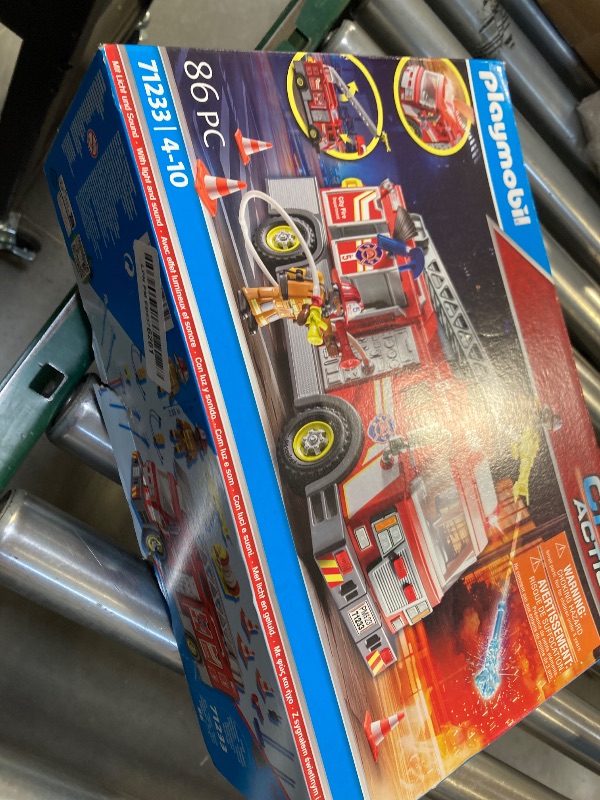 Photo 1 of Playmobil Fire Truck with Accessories and 2 Figures