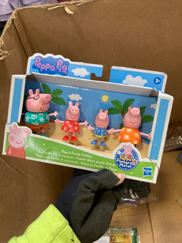 Photo 1 of Peppa Pig Toys Peppa's Family Holiday, 4 Family Figures in Tropical Holiday Outfits, Preschool Toys for 3 Year Old Girls and Boys and Up