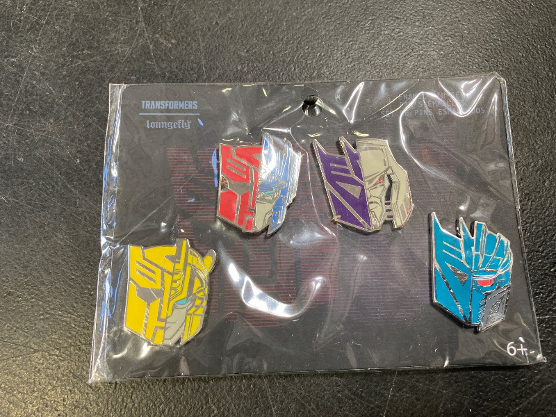 Photo 1 of Loungefly Hasbro Transformers 4-Pack Pin Set, Amazon Exclusive