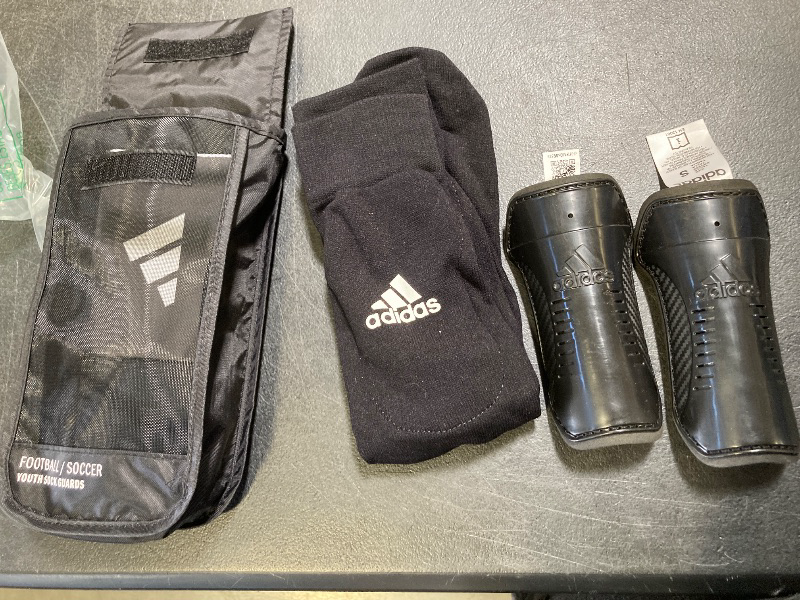 Photo 1 of adidas Unisex-Child Performance Youth Sock Shin Guards, Black/White, Small