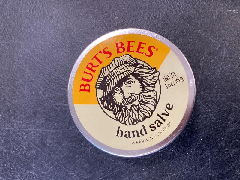 Photo 1 of Burt's Bees, Hand Salve With Botanical Oils and Beeswax, Moisturizing Balm for Dry Hands, 100 Percent Natural Origin Skin Care, 3 oz. Package