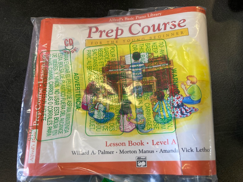 Photo 1 of Alfred's Basic Piano Prep Course Lesson Book, Bk A: For the Young Beginner, Book & CD (Alfred's Basic Piano Library, Bk A)