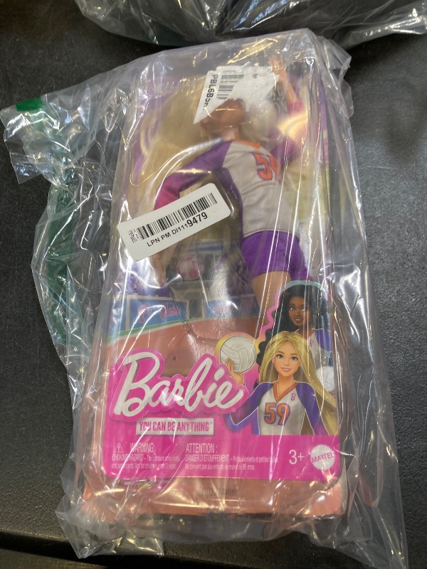 Photo 1 of Barbie Careers Fashion Doll & Accessory, Made to Move Volleyball Player Wearing Removable Uniform with Ball, 22 Bendable Joints