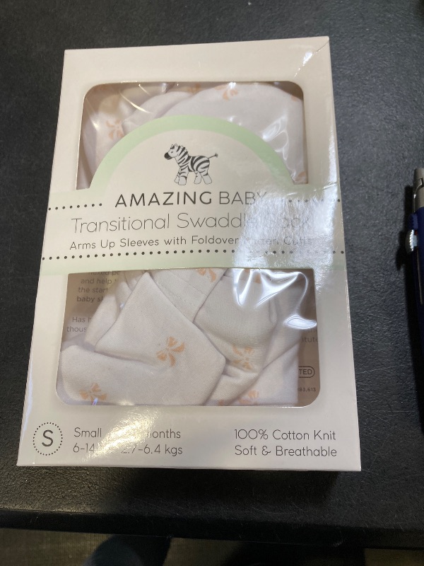 Photo 1 of Amazing Baby Transitional Swaddle Sack, Arms Up Half-Length Sleeves & Mitten Cuffs, Swaddle for Newborn Transition to Baby Sleep Sack Wearable Blanket, Small, 0-3 month, 6-14 lb, Pink Tiny Bows