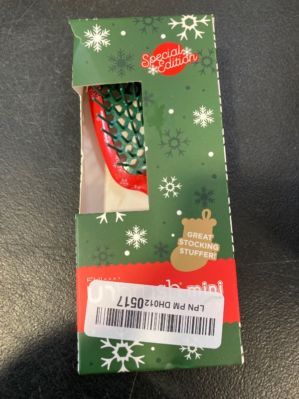Photo 1 of UNbrush Mini Holiday Hair Brush for Pain-Free Brushing On All Wet/Dry Hair Types — Mini UNbrush Detangling Brush with Durable Anti-Static Bristles, Lightweight & Vented — Christmas Hair Care Gifts