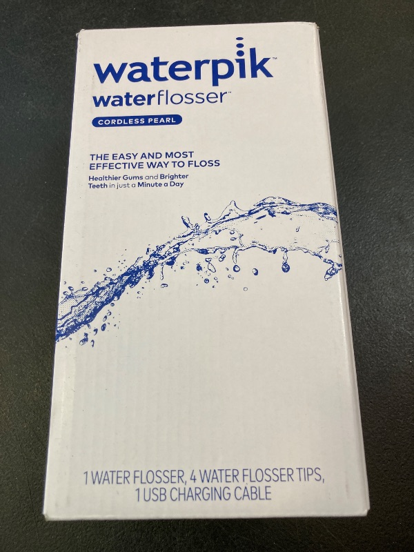 Photo 1 of Waterpik Cordless Pearl Rechargeable Portable Water Flosser for Teeth, Gums, Braces Care and Travel with 4 Flossing Tips - ADA Accepted, WF-13 White, Packaging May Vary
