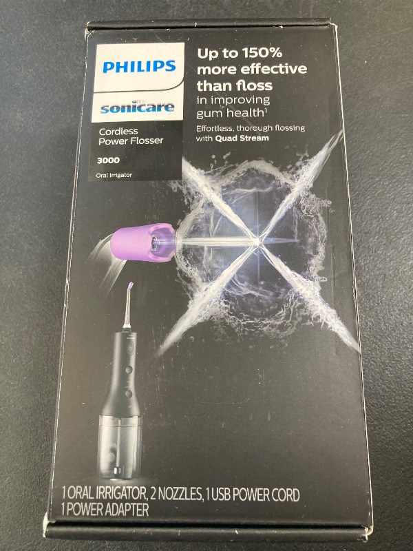 Photo 1 of Philips Sonicare Cordless Power Flosser 3000, Water Flosser with Innovative Quad Stream Technology, Oral Irrigator with 2 Flossing Modes and 3 Intensity Levels, Ergonomic Design, Black, HX3826/23