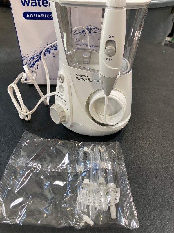 Photo 1 of Waterpik Aquarius Water Flosser Professional For Teeth, Gums, Braces, Dental Care, Electric Power With 10 Settings, 7 Tips For Multiple Users And Needs, ADA Accepted, White WP-660, Packaging May Vary