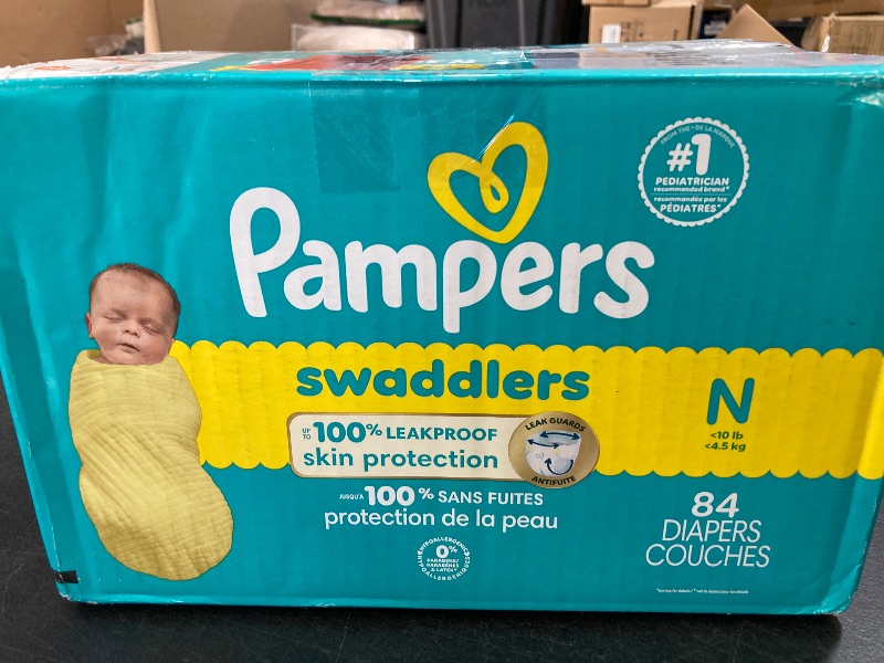 Photo 1 of Pampers Baby Diapers - Swaddlers - Size 0, 84 Count, Ultra Absorbent Disposable Newborn Diaper