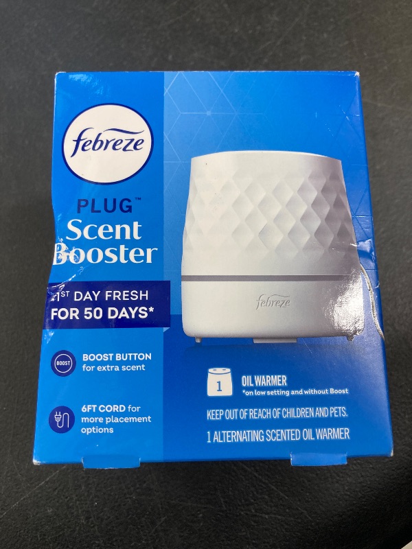 Photo 1 of Febreze Plug Scent Booster Continuous Scent Device Oil Diffuser, Compatible with Febreze Air Freshener Plug in Refills