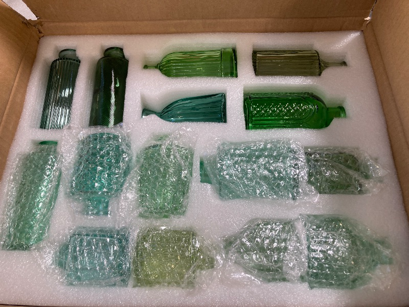 Photo 1 of Yaomiao 30 Pcs Vases Bulk Colored Flower Glass Vases Bud Vintage Colored Glass Bottles Colorful Rustic Embossed for Home Wedding Table Decorations Gifts (Green Series)