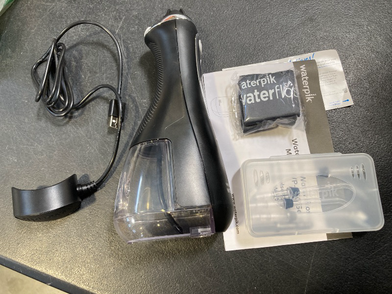 Photo 1 of Waterpik Cordless Advanced 2.0 Water Flosser For Teeth, Gums, Braces, Dental Care With Travel Bag and 4 Tips, ADA Accepted, Rechargeable, Portable, and Waterproof, Black WP-582