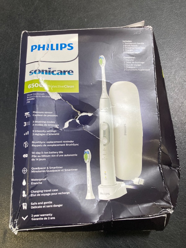 Photo 1 of Philips Sonicare ProtectiveClean 6500 Rechargeable Electric Toothbrush, with Pressure Sensor, 3 Cleaning Modes, SmarTimer and QuadPacer, 14-Day Battery Life, Charging Travel Case, White, HX6462/05