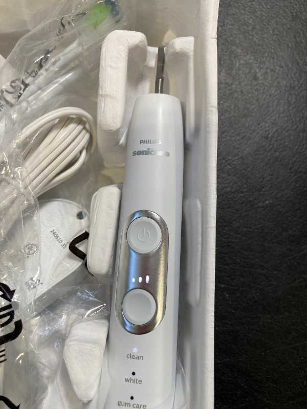 Photo 1 of Philips Sonicare ProtectiveClean 6500 Rechargeable Electric Toothbrush, with Pressure Sensor, 3 Cleaning Modes, SmarTimer and QuadPacer, 14-Day Battery Life, Charging Travel Case, White, HX6462/05