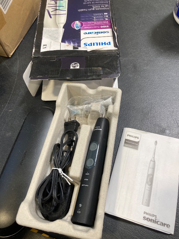 Photo 1 of Philips Sonicare ProtectiveClean 5100 Rechargeable Electric Toothbrush, with Pressure Sensor, 3 Cleaning Modes, SmarTimer and QuadPacer, 14-Day Battery Life, Travel Case, White, Model HX6857/11