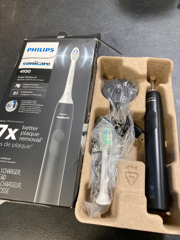 Photo 1 of Philips Sonicare 4100 Rechargeable Electric Toothbrush, with Pressure Sensor, 2 Intensity Settings, SmarTimer and QuadPacer, 14-Day Battery Life, Black, Model HX3681/24