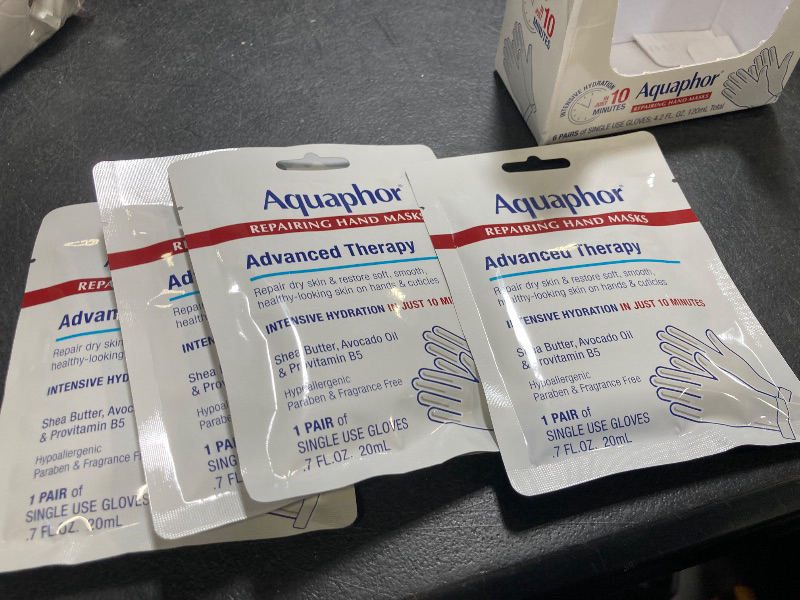 Photo 1 of Aquaphor Repairing Hand Masks, Moisturizing Gloves for Dry Hands, Moisturizer for Dry Skin with Avocado Oil and Shea Butter, Pack of 4