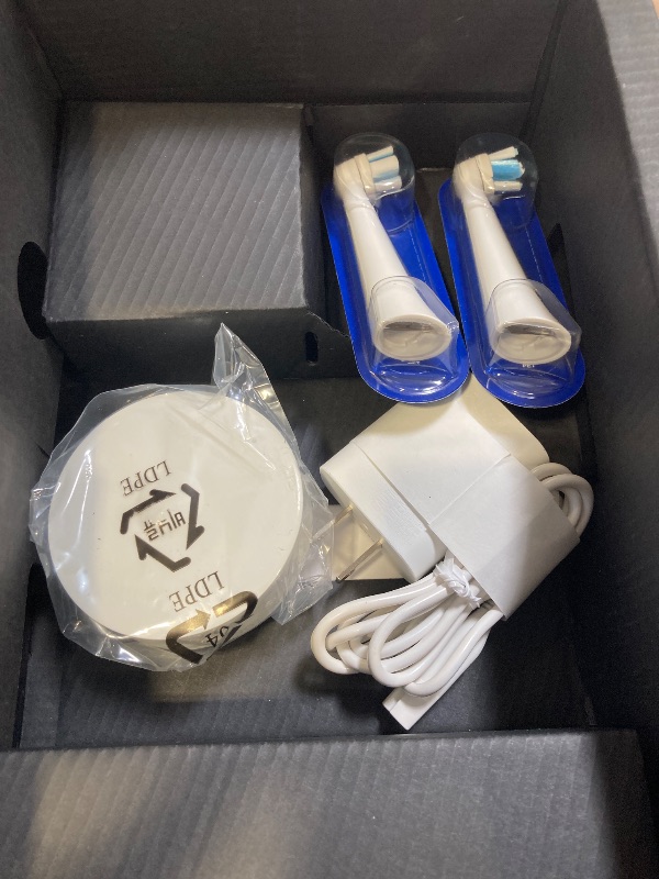 Photo 1 of Oral-B iO Series 10 Rechargeable Electric Toothbrush Replacement Toothbrush Heads, and Charging, White