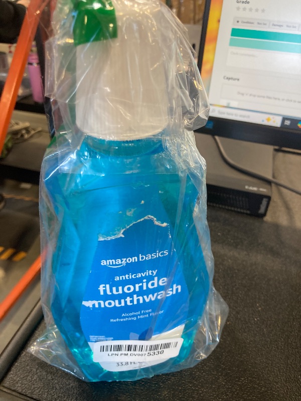 Photo 1 of Amazon Basics Fluoride Mouthwash for Adults, Anticavity, Alcohol Free - Refreshing Mint Flavor, 1 Liter, 1-Pack