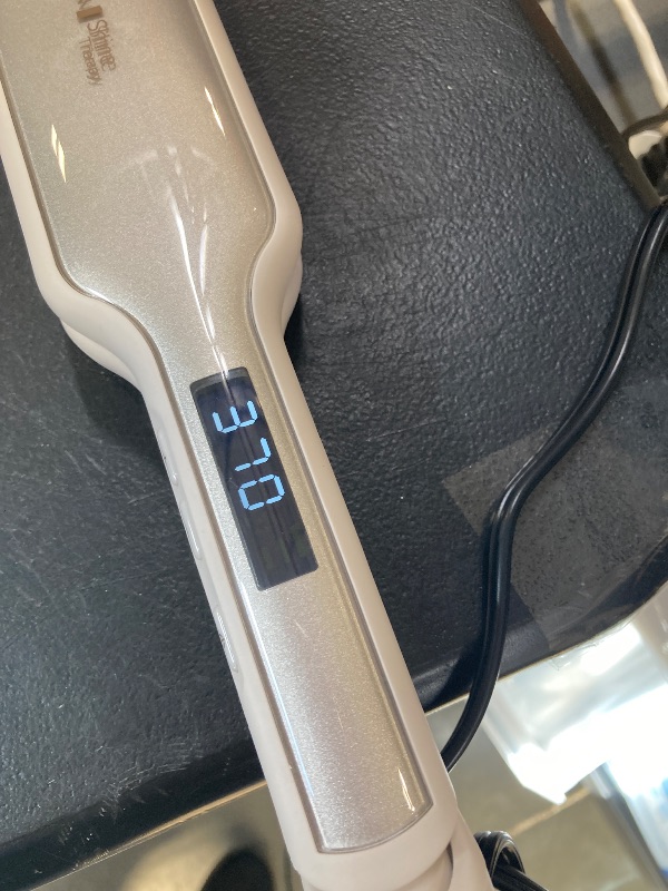Photo 1 of Remington Shine Therapy 2 inch Hair Straightener, Flat Iron Infused with Argan Oil & Keratin, Professional Ceramic Flat Iron for Less Frizz, Shiny & Smooth Hot Styling Tools