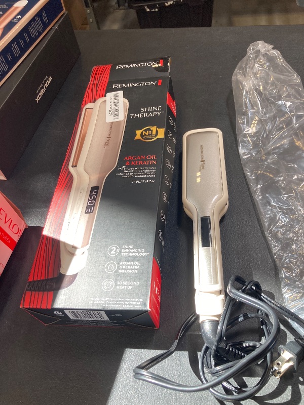 Photo 1 of Remington Shine Therapy 2 inch Hair Straightener, Flat Iron Infused with Argan Oil & Keratin, Professional Ceramic Flat Iron for Less Frizz, Shiny & Smooth Hot Styling Tools