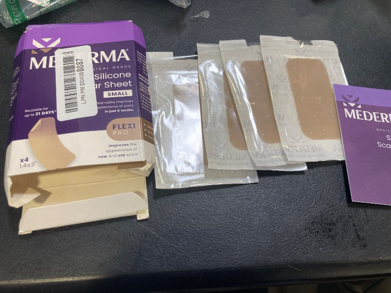 Photo 1 of Mederma Medical Grade Silicone Scar Sheets; Improves The Appearance of Old and New Scars; for Injury, Burn and Surgery Scars, 4 Count