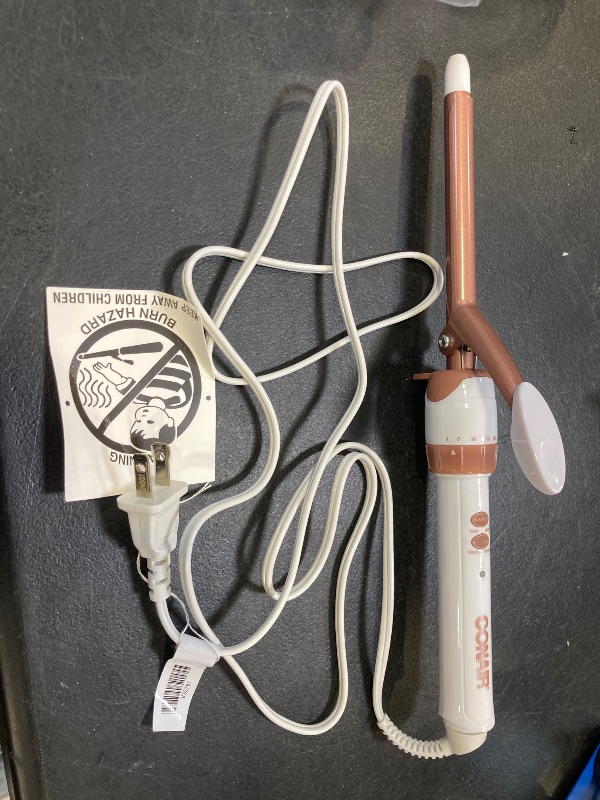 Photo 1 of Conair Double Ceramic 1/2-Inch Curling Iron, 1/2-inch barrel produces spiral curls – for use on short to medium hair