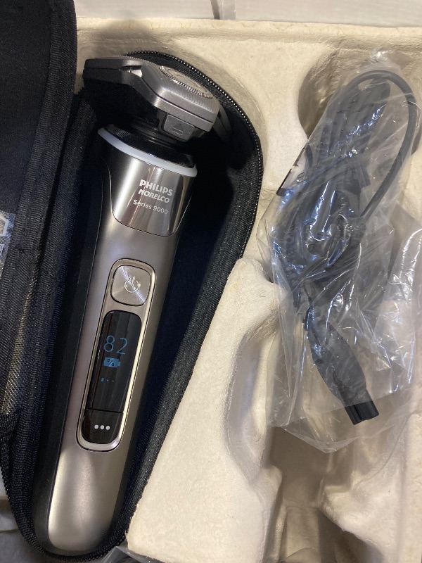 Photo 1 of Philips Norelco Shaver Series 9000, Wet and Dry Electric Shaver, with Lift & Cut Shaving System and SenseIQ Technology, Pop-up Trimmer, Cleaning Pod, Charging Stand and Travel Case, Model S9987/85