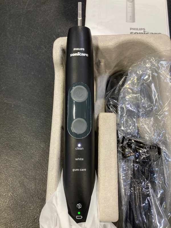 Photo 1 of Philips Sonicare Protective Clean 5100 Rechargeable Electric Toothbrush, with Pressure Sensor, 3 Cleaning Modes, SmarTimer and QuadPacer, 14-Day Battery Life, Travel Case, Black, Model HX6850/60
