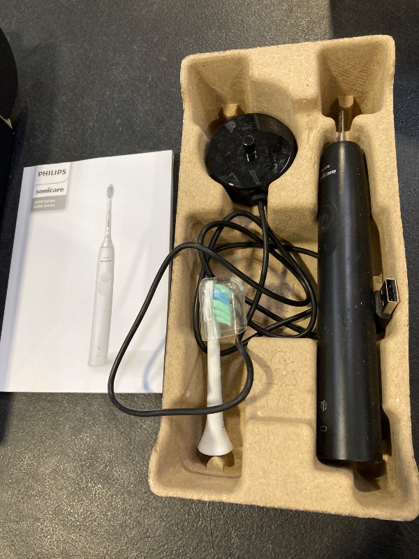 Photo 1 of Philips Sonicare 4100 Rechargeable Electric Toothbrush, with Pressure Sensor, 2 Intensity Settings, SmarTimer and QuadPacer, 14-Day Battery Life, Black, Model HX3681/24