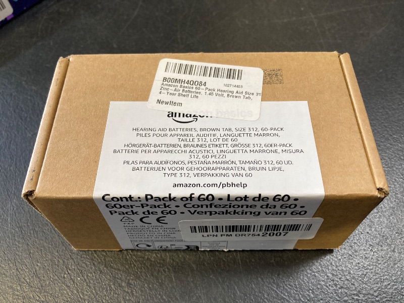 Photo 1 of Amazon Basics 60-Pack Hearing Aid Size 312 Zinc-Air Batteries, 1.45 Volt, Brown Tab, 4-Year Shelf Life