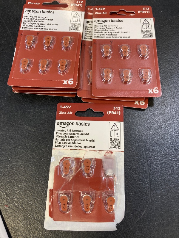 Photo 1 of Amazon Basics 60-Pack Hearing Aid Size 312 Zinc-Air Batteries, 1.45 Volt, Brown Tab, 4-Year Shelf Life