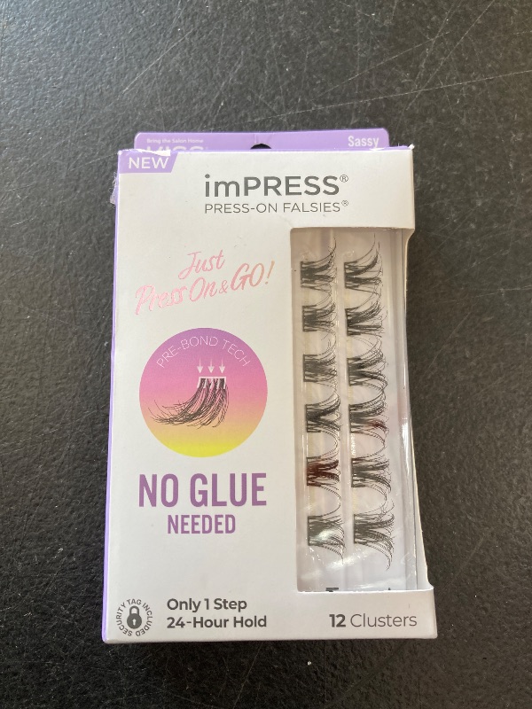 Photo 1 of KISS imPRESS False Eyelashes, Lash Clusters, Falsies, Sassy Wispy', 12mm-14mm, Includes 12 pieces of pre-bonded lashes, Contact Lens Friendly, Easy to Apply, Reusable Strip Lashes