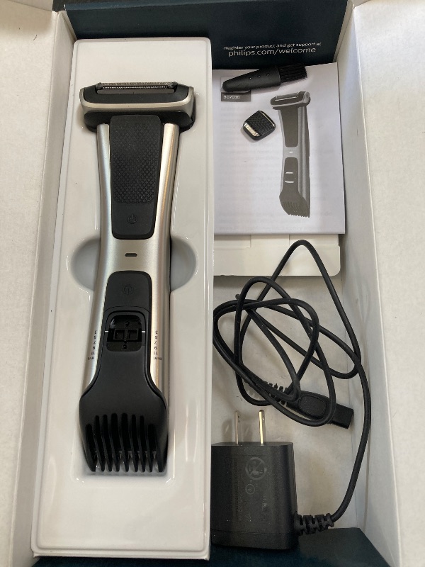 Photo 1 of Philips Norelco Bodygroom 7000 Series, Showerproof Groin and Body Trimmer for Men, Precise Body Grooming, Adjustable Comb, Safe Even Below The Belt, 80 Min. Runtime, Model BG7030/49