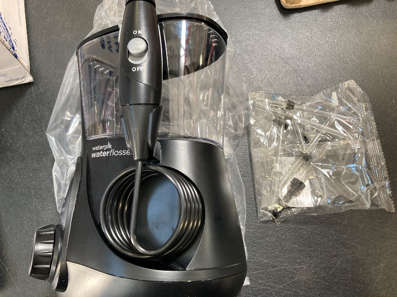 Photo 1 of Waterpik Aquarius Water Flosser Professional For Teeth, Gums, Braces, Dental Care, Electric Power With 10 Settings, 7 Tips For Multiple Users And Needs, ADA Accepted, Black WP-662